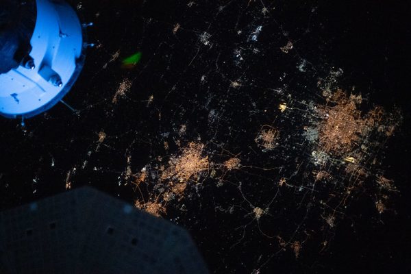 The night lights of Beijing and Tianjin in China are pictured from the International Space Station as it orbited 264 miles above the Asian continent near the Yellow Sea.