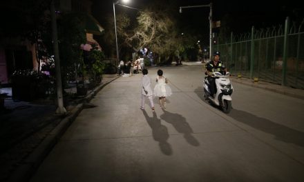 Photo: Local children and police patrol, Kashgar Old City, by Polina Fedorova
